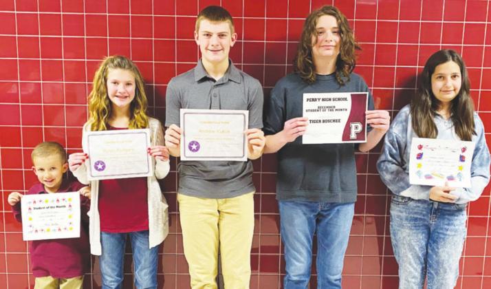 Pictured above are Perry Public Schools December Students of the Month are Jackson Rodgers, Joanna Lane, Andrew Kukuk, Tiger Boschee. Also pictured is Rylan Rodgers, November’s Junior High Student of the Month who was unable to attend last month’s meeting.