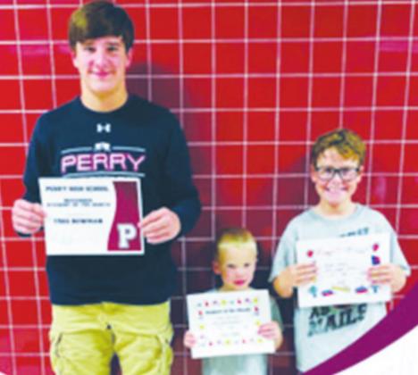 Perry Students of the Month are from left, Treg Bowman, 10th grade; Knox Williams, Pre-K; and Ryder Jones, 5th grade. Not pictured is Rylan Rodgers.