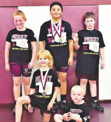 Above is the Perry Youth Wrestling Team. Members are, front row from left, Alexus Dunagan, Johnathan Gillinger; back row from left are Kieren Postier, Donald Neal, and Luke Taylor.