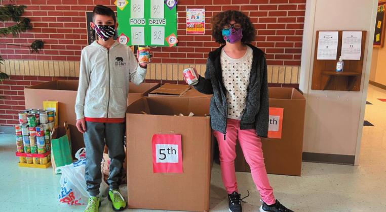 5th grade was the food drive winning class of the upper elementary; Pictured from left are: Cameron Rose and Berkley Bynum