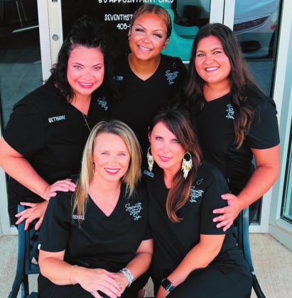 At right are staff members of Perry’s new Seventh Street Spa, opening to the public by appointment on July 11. Pictured are, front row, from left, Connie Smith and Kaycie Purdy. Back row, from left, are Bethany Bland, Tyleigh Smith, and Aspen Ward.