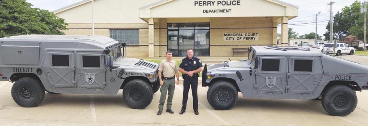 After NCSO was gifted with a Humvee last year, OBN gifted PPD with one this year. Above are NCSO Sheriff Matt Mcguire, left, and PPD Chief Brian Thomas with each departments Humvee.