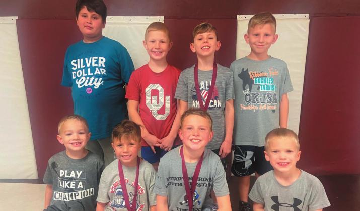 Above are PWA wrestlers from the Jenks Tournament. In back row, from left, are Matthew Stone, Carson Jardot, Heston Klinglesmith and Maddox O’Dell; front row are wrestlers John MacMunn, Easton Klinglesmith, Brody Schechter, and Know Williams. Seen at right are PWA wrestlers Ashton and Ezekiel Fee and below are Aspen Atkinson and Heston Klinglesmith.