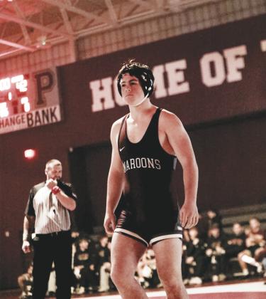 Perry High School and Junior High boys wrestling dual vs. Owasso. Photos by PHS Yearbook.
