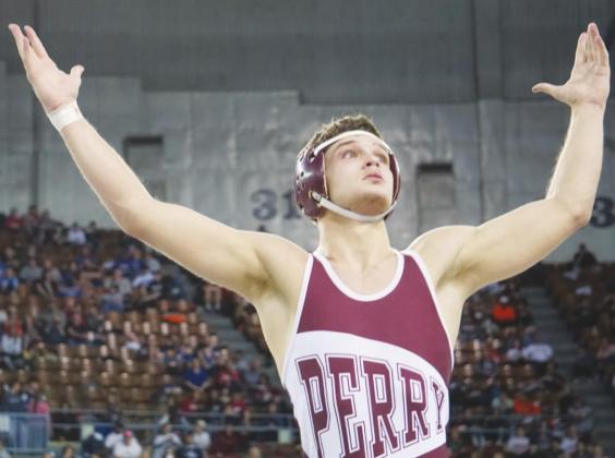 Maroon wrestlers Chance Davis, above, and Kaleb Owen, at left claimed individual state titles at the 2022 State Wrestling Tournament at the Jim Norick Arena in Oklahoma City. Maroons placed 9th.