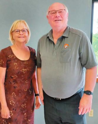 Rotarian Carol Dvorak introduced Sid Sperry at Rotary Club meeting.