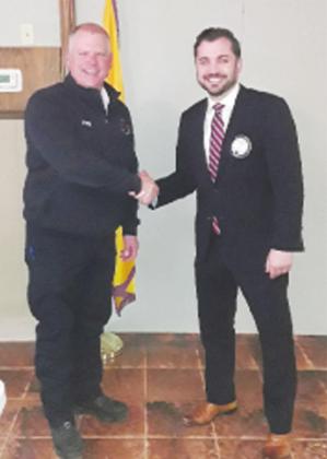 Fire Chief Russell Brand was a guest Speaker at Perry Lions club meeting. He is seen with Lion Shane Leach on the right.