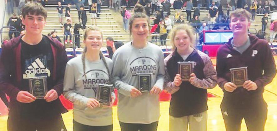 All-Tournament team pictured above, from left are Bryson Cash, Kennedy Hight, Braylee Dale (named MVP), Maebry Shields, and Dylan Hight.
