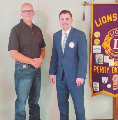 From left, Senior Facility Manager of Ditch Witch, Tracy Scherman is seen with Lions Club President, Shane Leach.
