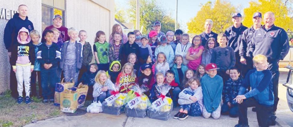 Perry third grade students honor first responders on World Kindness Day