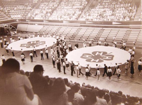 Delegates in this undated photo take part in State 4-H Roundup in what is now Gallagher/ Iba Arena on the Oklahoma State University campus in Stillwater. Oklahoma 4-H’ers will gather at OSU in July to celebrate the 100th anniversary of State 4-H Roundup.